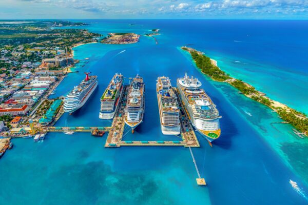 Aerial view of cruise ships docked at Nassau, Bahamas — a top Caribbean port for gay cruises in 2026