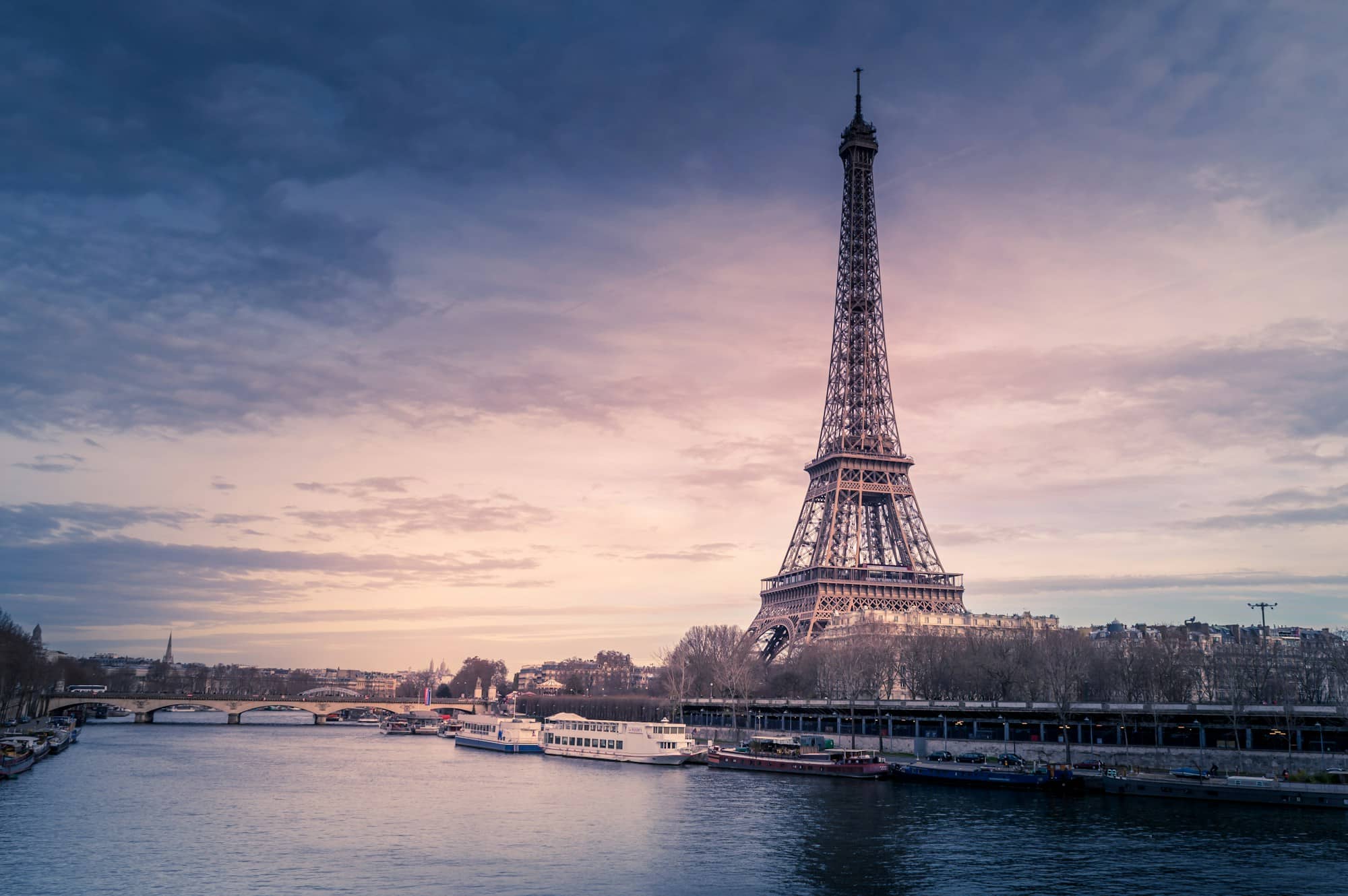 Eiffel Tower and the Seine river at sunset — Paris gay travel guide